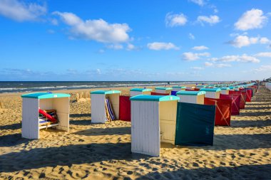 Beach huts on an Atlantic ocean coast sand beach by Katwijk aan Zee, South Holland, Netherlands