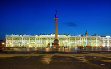The Winter palace, former residence of the kings, illuminated in the night in the historical city center of Saint Petersburg, Russia