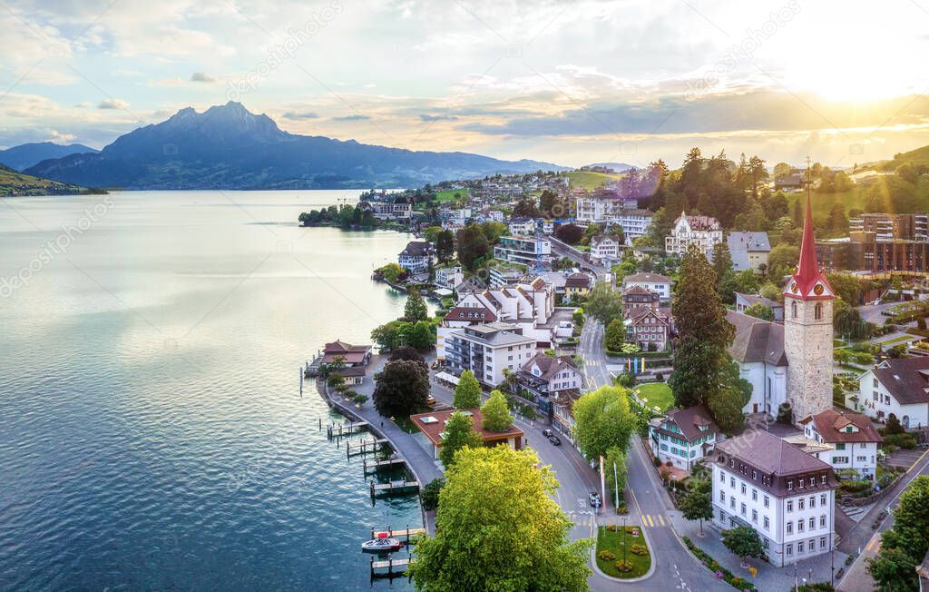 Weggis, Switzerland, view of the Old town, Lake Lucerne and Mount Pilatus on sunset