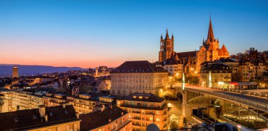Panoramic view of Lausanne city, Switzerland, in sunset light clipart