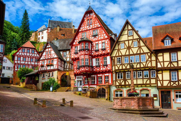Colorful gothic style half-timbered houses in historical Old town of Miltenberg, Bavaria, Germany. Miltenberg is a popular travel destination near Frankfurt am Main, Germany.