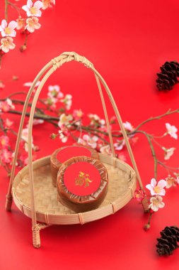 Nian Gao veya Çin Yeni Yılı Tatlı Pirinç Keki (Tikoy, Fa Gao), Kue Keranjang veya Kue Bakul kadar popülerdir.