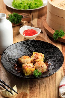 Mini Çin Dim Sum ve biber yağı.