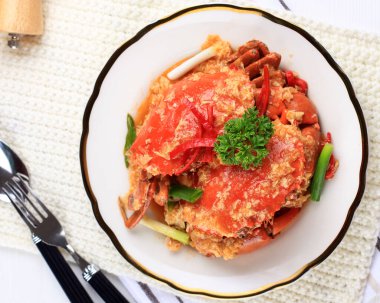 Chilli Mud Crab, Crab with Singaporean Sauce, Special Singapore Cuisine. Served on White Plate