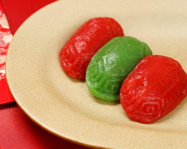 Ang Kue or Kue Ku or Kue Thok, Steamed Chinese Pastry of Sticky Rice Flour with Sweet Mung Bean Paste Filling. Sticky, Chewy Texture, Usually Colored Red  clipart