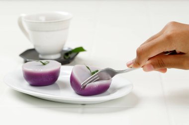 Fluffy Texture Kue Talam Ubi Ungu, Purple Sweet Potato Steamed Cup Cake, Popular as Kue Nona Manis clipart