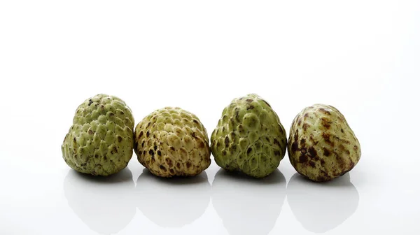 Four Sugar Apple Fruit or Buah Srikaya with Beautiful Imperfection, Isolated on White