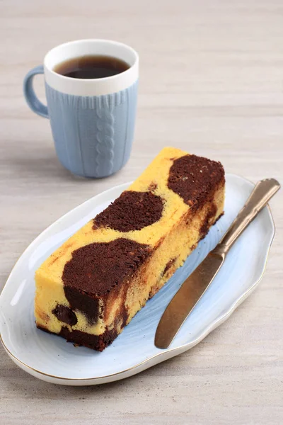 Travel Cake, Mini Loaf Marble Cake with melted Chocolate Inside. Also Known as Tube Cake. Served with Tea
