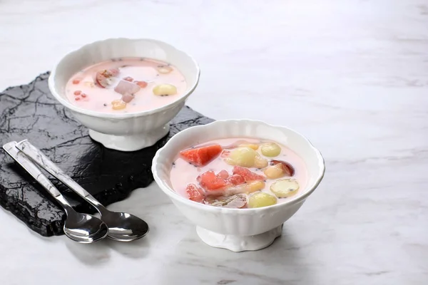 Ximilu or Es Campur Hongkong, Made of Jelly, Tapioca Pearl, Water Melon, Melon, Sweet Basil Seed (Selasih), and Coconut Milk or Condensed Milk. Copy Space for Text
