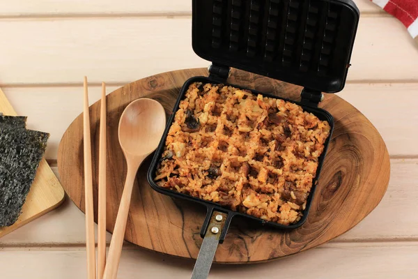 Waffle Kimchi Fried Rice (Kimchi Bokkeumbap) or Nasi Goreng Waffle, Trendy Viral Rice Pressed Using Waflle Maker, Popular in South Korea