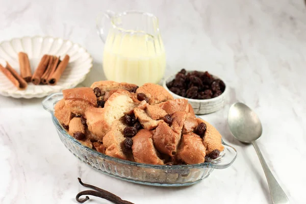 Cinnamon Bread Pudding Breakfast Casserole Vanilla Sauce White Marble Background — Stock Fotó