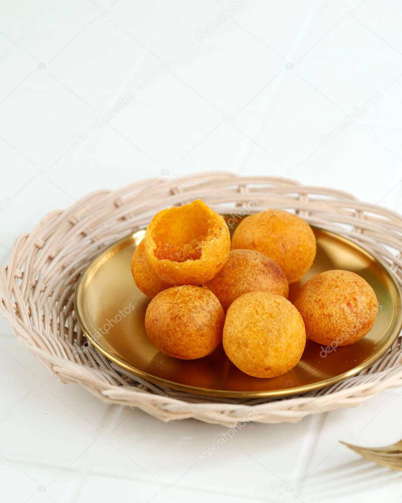 Kue Bola Bola Ubi or Obi Sweet Potato Ball, Bandung Popular Traditional Street Food, Made from Sweet Potatoes, Flour, and Sugar, Shaped into Ball then Deep Fried Twice.