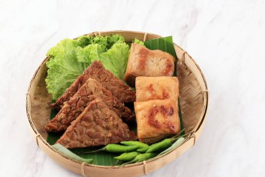Selected Focus Tahu Tempe Bacem Served with Green Chilli on Bamboo Plate