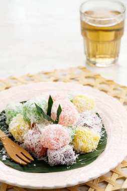Ongol Ongol Singkong, Indonesian Traditional Steamed Cake Made From Cassava with Garted Coconut Coating. One Various of Jajanan Pasar