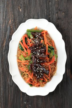 Japchae, Chap Chae Korean Noodle Dish with Beef Bulgogi Topping,  Top View