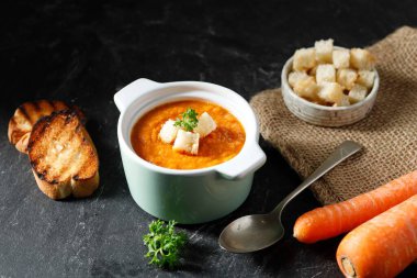 Vegetarian Carrot Soup with Bake Baguette, Concept Healthy Slow Food Concept