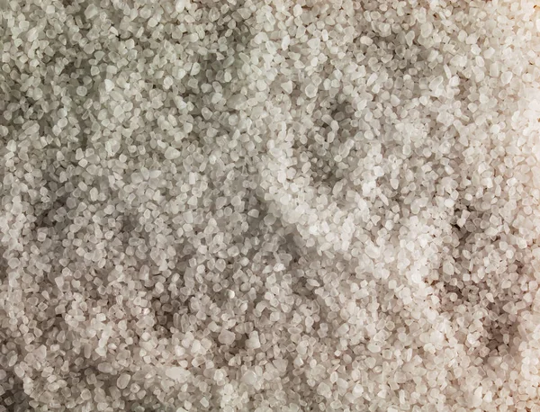 粗挽き塩の背景 接近中だ 調味料の海塩の食感 — ストック写真