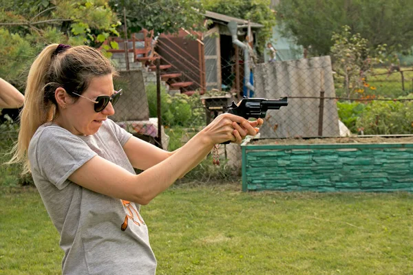 Young Pretty Woman Gun Girl Black Glasses Takes Aim Shot Stock Photo