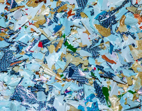 Remains of a biodegradable plastic bag after decomposition. Self-degrading plastic. Ecology concept. Background.