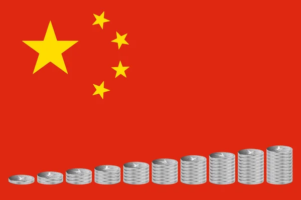 中国国旗背景上成堆的银质元硬币 — 图库照片