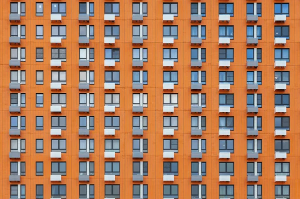 Obrázek Pozadí Oranžová Stěna Vícepodlažní Budovy — Stock fotografie