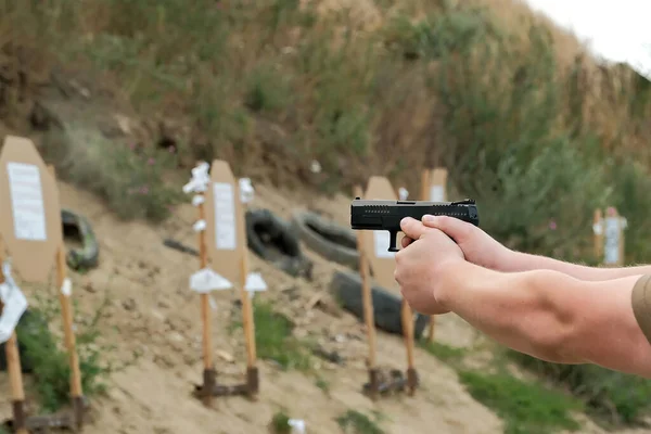 Man Holds Gun His Hands Pistol Shooting Exercises — Stockfoto