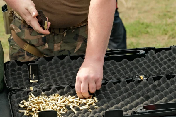 Man Loads Cartridges Clip Live Ammunition Pistol — 스톡 사진