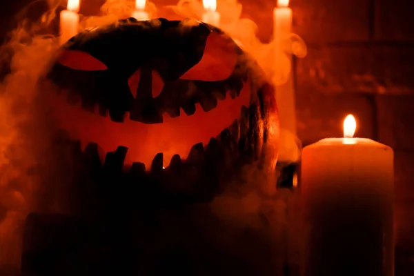 Halloween Holiday Attributes Halloween Carved Pumpkin Candles Smoke Dark Scene — Stock Photo, Image