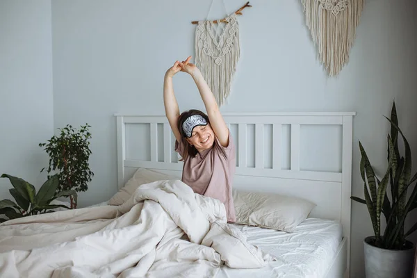 Happy Young Brunette Girl Night Mask Her Head Stretches Morning — Stock Photo, Image