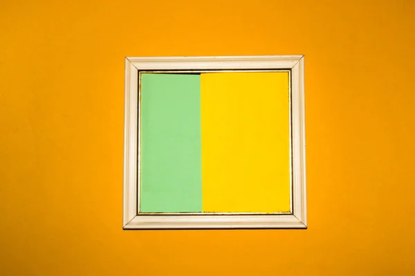 frame with yellow-pastel green copy space, around the frame yellow background, summer design