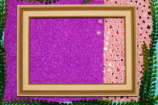 old wooden frame on purple-pink glittery background, tropical leaves around the frame, creative art design, invitation, birthday card