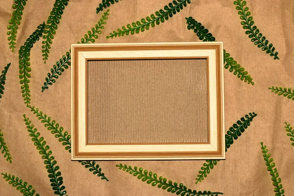 frame with vintage wallpaper as copy space, around frame vintage wallpaper with jungle leaves, abstract natural summer wallpaper