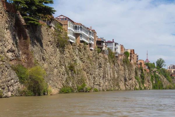 Historic residential buildings on the banks of the steep banks of the Mtkvari River. Georgia country
