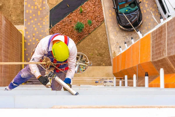 High-altitude worker. Industrial climber.High-rise works. Rock-climber. Industrial mountaineering. worker on high rise building