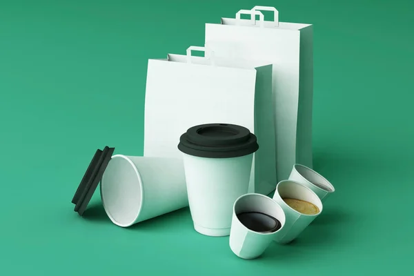 Set Aus Weißer Papiereinkaufstasche Und Kaffeetassen Auf Grünem Pastell Hintergrund — Stockfoto