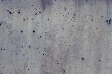 Küçük deliklerle dolu delikli çimento delikleri, desenli arkaplan görüntüsü