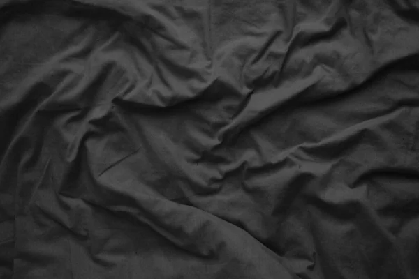 Černá látka. Cottone. Textura a pozadí. — Stock fotografie