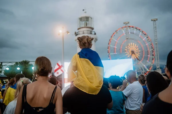 24.08.2022 - Batumi, Georgia. Ukraines Independence Day. Anti-war rally in Georgia. National symbols, Ukrainian flag. Refugees. No war. High quality photo