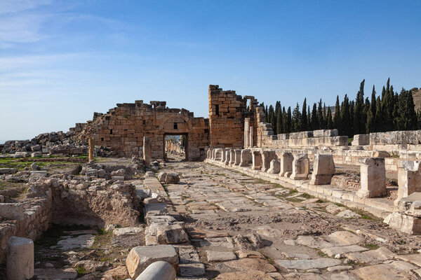 Pamukkale, Denizli, Turkey: April 03 2016: Domitian gate and Frontinus street in Hierapolis