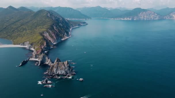 A bay with narrow rocks in Kamchatka — Stockvideo