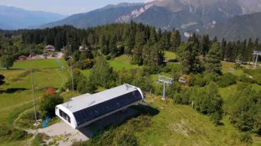flight over the cable car in the mountains