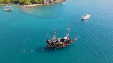 flying around a pirate ship in the mediterranean sea