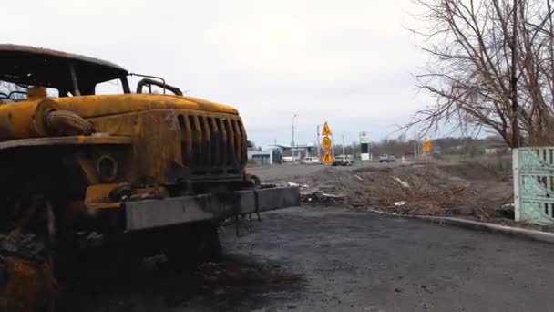 A wrecked military vehicle in Ukraine. Irpin-Kyiv- April 2022 — стокове відео