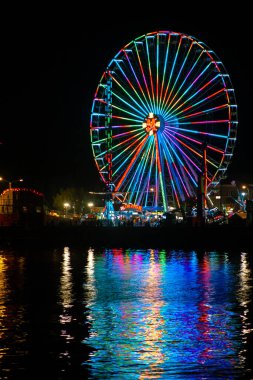 Ferris wheel splashes bright colors