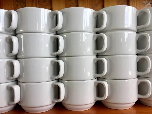 Arrangement Ceramic Glasses Neatly Lined Shelf — Zdjęcie stockowe