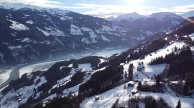 Austrian Alps Cold Mountain Top Snow Mountains Peaks Landscape Drone Aerial Flight drone flyover the mountains and skiing village