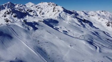 Austrian Alps Cold Mountain Top Snow Mountains Peaks Landscape Drone Aerial Flight drone flyover the mountains and skiing village