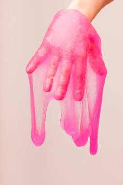 a toy for children mucus and liquid flowing on hand