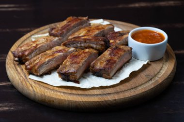 delicious ribs with sauce