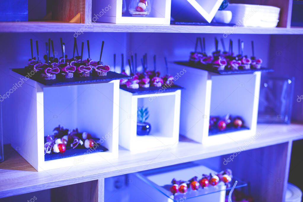 Refined buffet and snacks with blue light 